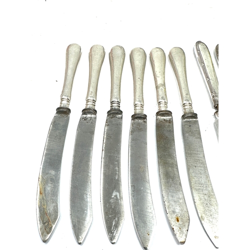 9 - 2 antique sets of 6 silver handle knives