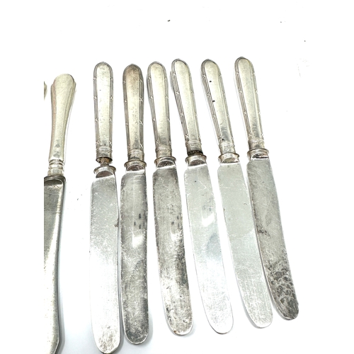 9 - 2 antique sets of 6 silver handle knives