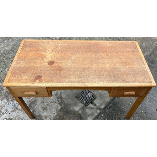 409 - 1950's Oak 2 drawer desk, approximate measurements: Height 30 inches Width 54 inches Depth 27 inches