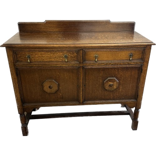 430 - Oak two drawer two door sideboard measures approx 21 inches tall including back,  48 wide and 19 dee... 