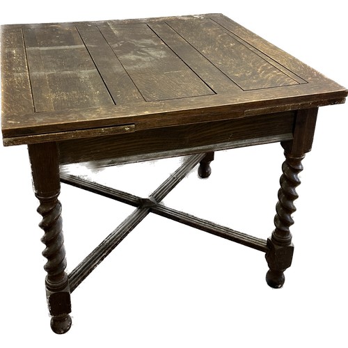 405 - Oak barley twist leg drop leaf table measures approx 30 inches tall by 36 wide and 36 deep