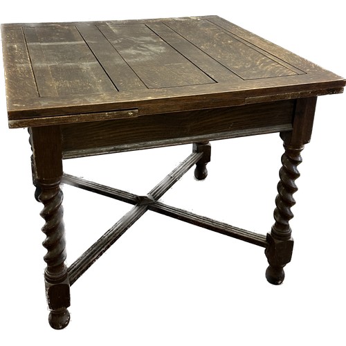 405 - Oak barley twist leg drop leaf table measures approx 30 inches tall by 36 wide and 36 deep