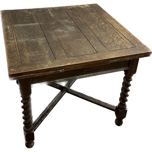 405 - Oak barley twist leg drop leaf table measures approx 30 inches tall by 36 wide and 36 deep