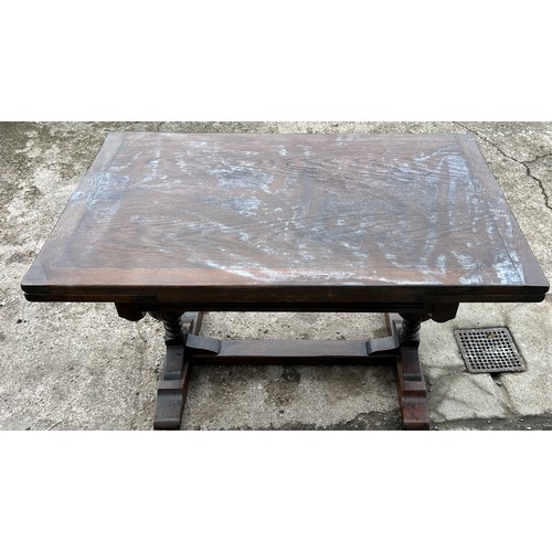 377 - Oak draw leaf table, baulbaus leg detailing, water damaged top approximate measurements: Height 30 i... 