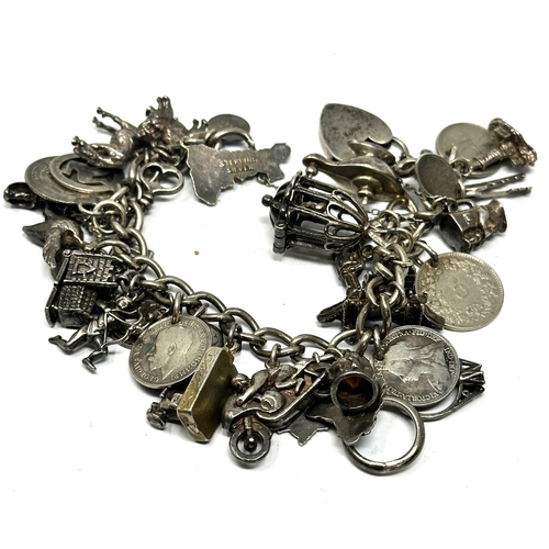 261 - Vintage silver charm bracelet weight 92g