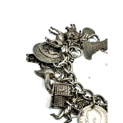 261 - Vintage silver charm bracelet weight 92g