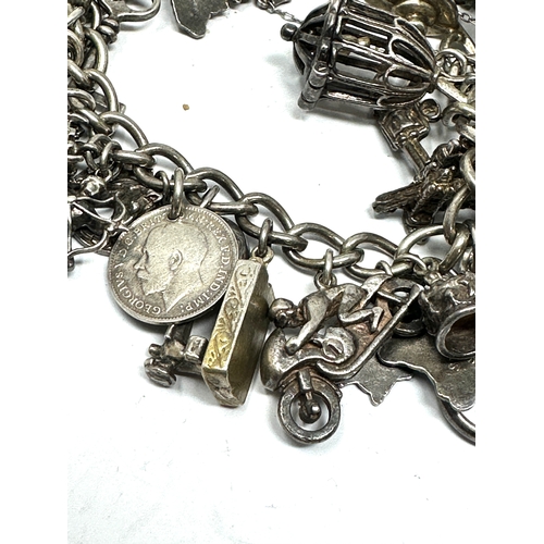 261 - Vintage silver charm bracelet weight 92g