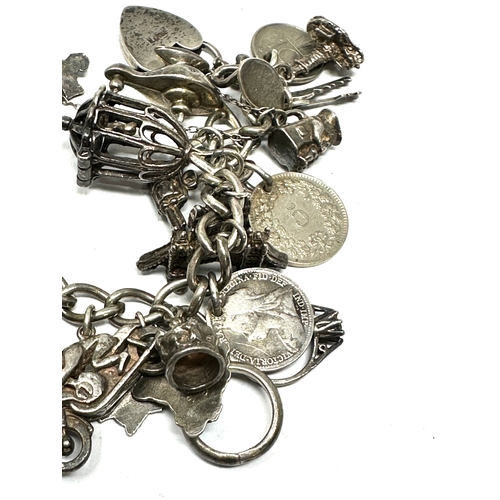 261 - Vintage silver charm bracelet weight 92g