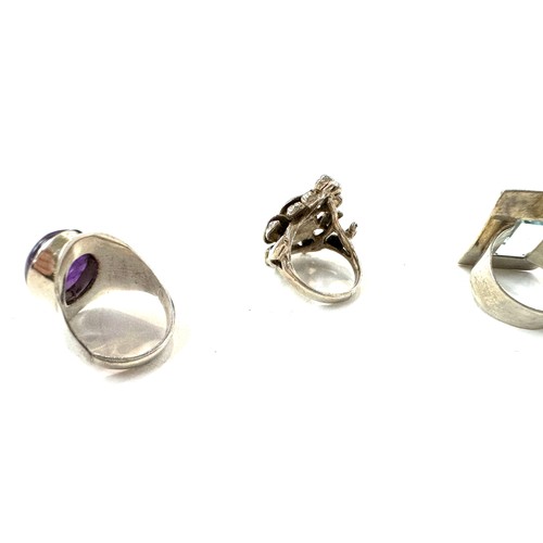 507 - 4 Silver rings, 3 stone set, Sizes L, N, M, total overall weight 29.9g