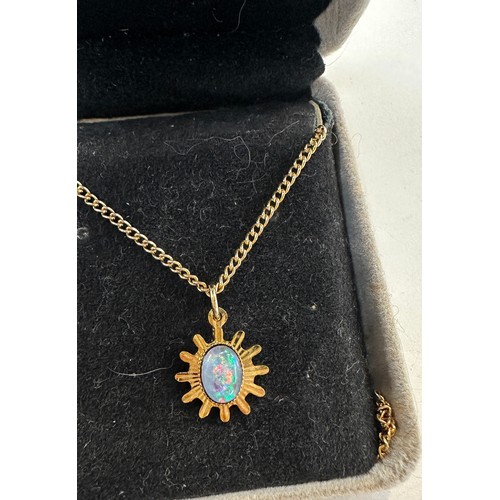 497 - Unmarked gold metal Australian opal pendant and chain