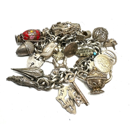 270 - Vintage silver charm bracelet inc opening charms weight 96g