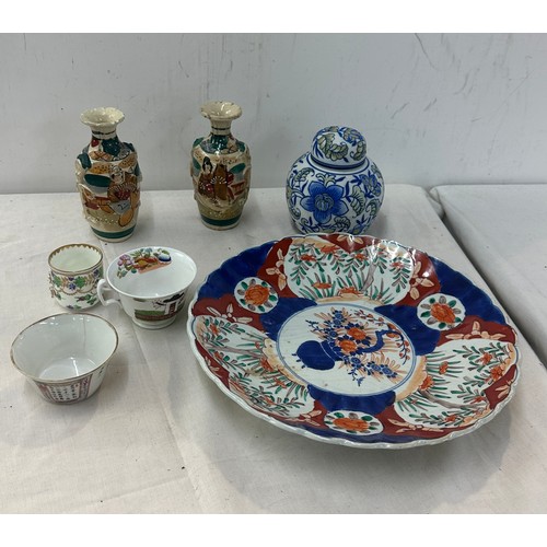 312 - Selection of oriental pottery includes charger, vases etc