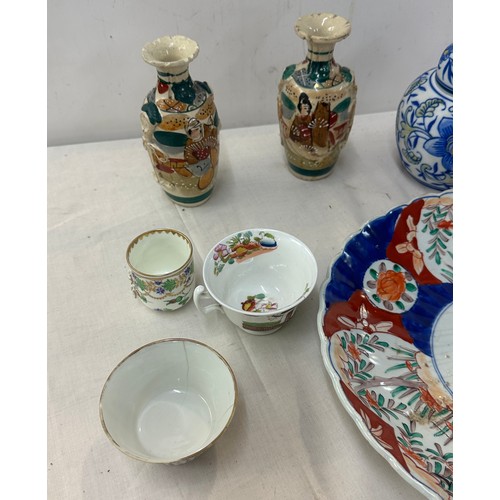 312 - Selection of oriental pottery includes charger, vases etc