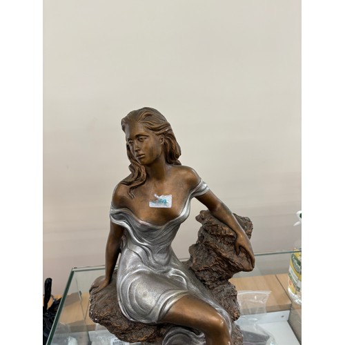 25 - Signed lady figure measures approximately 17.5 inches