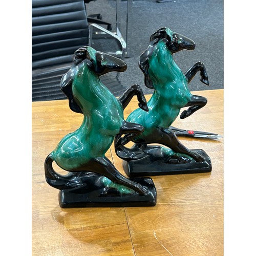 41 - Pair of Canadian blue horses measures approximately Height 14 inches, Width 9.5 inches