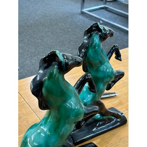 41 - Pair of Canadian blue horses measures approximately Height 14 inches, Width 9.5 inches