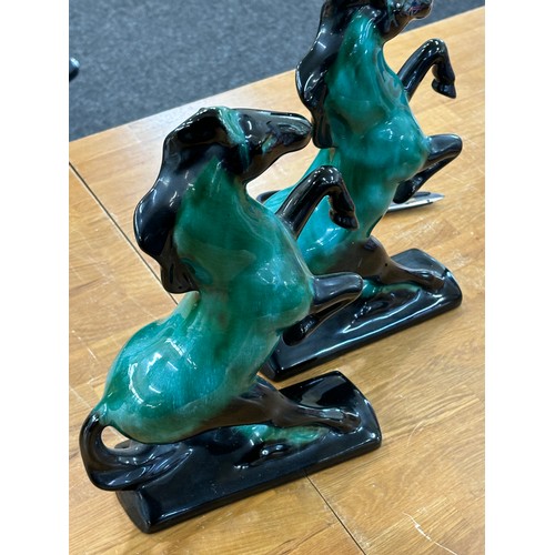 41 - Pair of Canadian blue horses measures approximately Height 14 inches, Width 9.5 inches