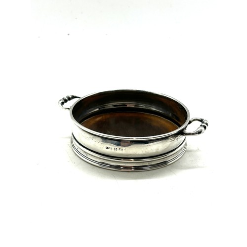 530 - Hallmarked silver 2 handled coaster