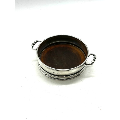 530 - Hallmarked silver 2 handled coaster