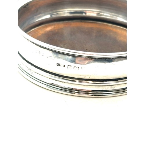 530 - Hallmarked silver 2 handled coaster