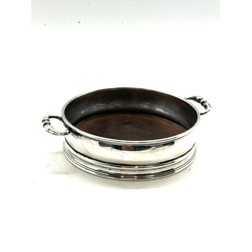 530 - Hallmarked silver 2 handled coaster