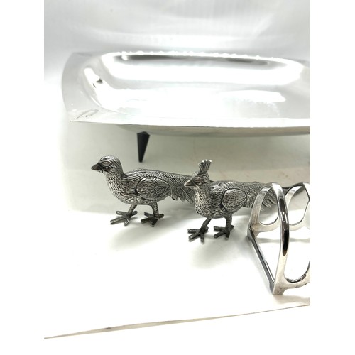 589 - Selection of silver plated items includes Tray, pheasant, toast rack etc