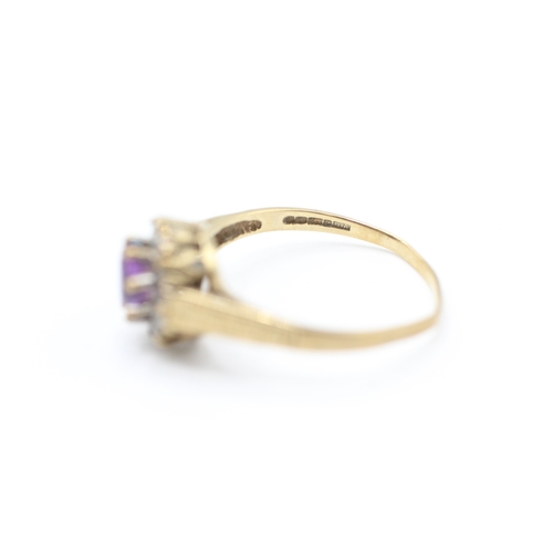 101 - 9ct gold vintage amethyst and diamond halo dress ring (1.6g)