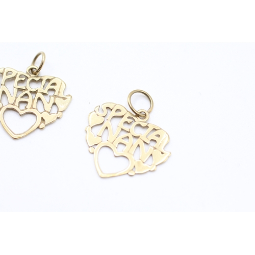 104 - 9ct gold set of two special nana pendants (1.1g)