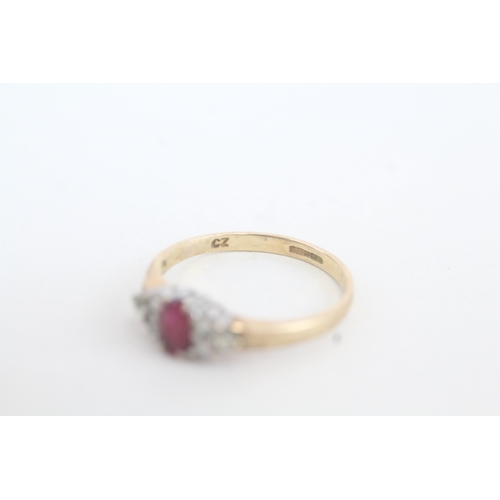 119 - 9ct gold ruby and white gemstone ring (2g)