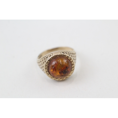 122 - 9ct gold amber cabochon ring (2g)