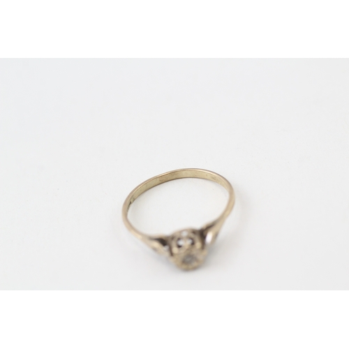 124 - 9ct gold diamond ring (1.3g)