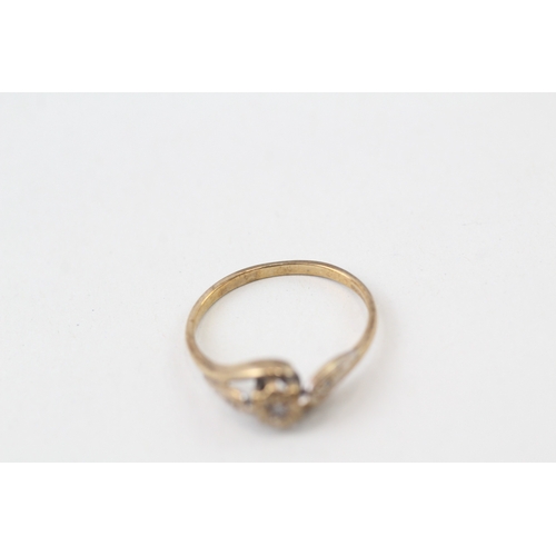 127 - 9ct gold diamond ring (1.6g)