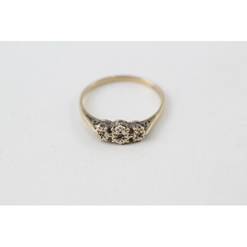 128 - 9ct gold three diamond ring (1.3g)