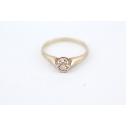 131 - 9ct gold single diamond set ring (1.7g)