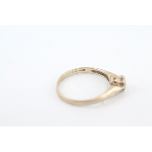 131 - 9ct gold single diamond set ring (1.7g)