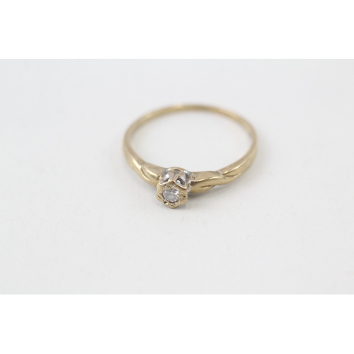 138 - 9ct gold illusion set diamond solitaire ring (1.4g)