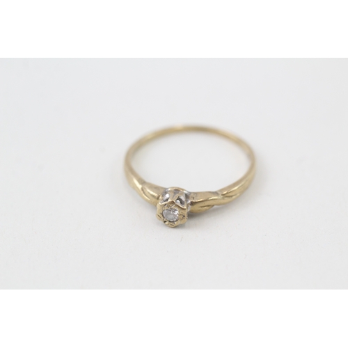 138 - 9ct gold illusion set diamond solitaire ring (1.4g)