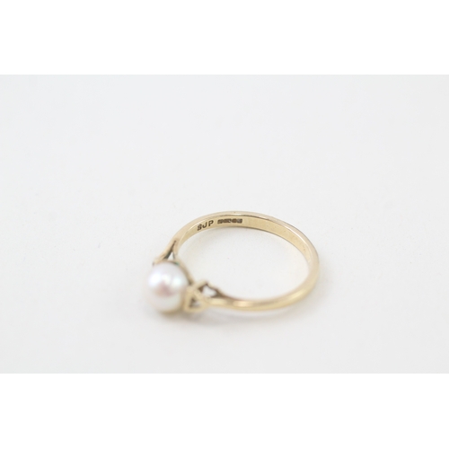 144 - 9ct gold cultured pearl set solitaire ring (1.8g)