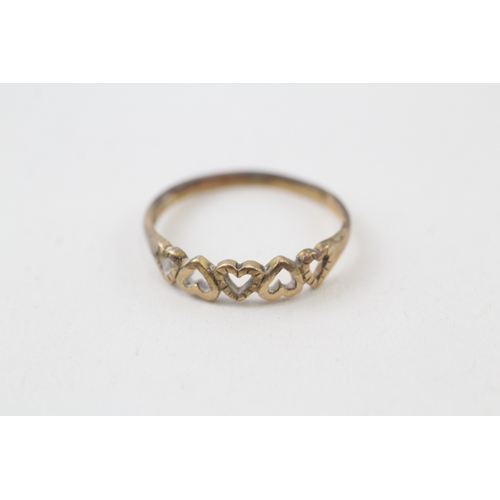 145 - 9ct gold nine open heart eternity ring (1.3g)