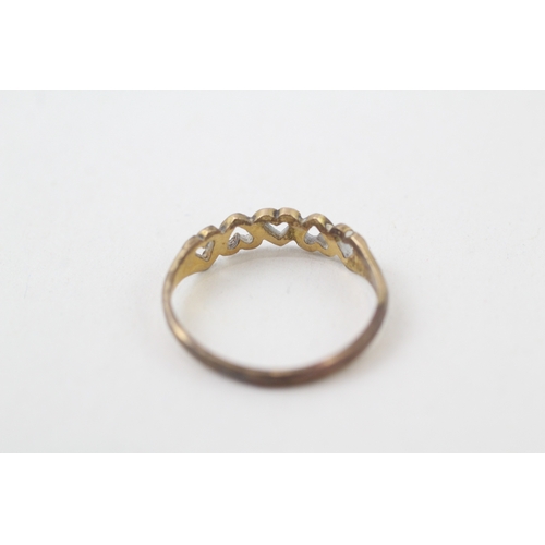 145 - 9ct gold nine open heart eternity ring (1.3g)