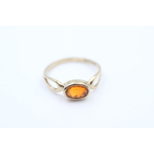 153 - 9ct gold orange paste single stone ring (1.4g)