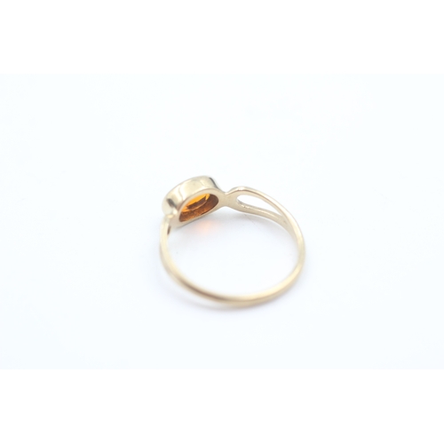 153 - 9ct gold orange paste single stone ring (1.4g)