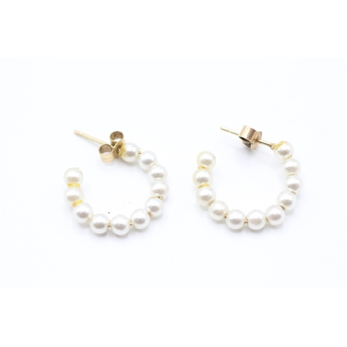 158 - 9ct gold simulated pearl half hoop earrings (0.8g)