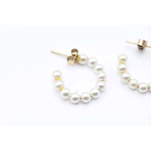 158 - 9ct gold simulated pearl half hoop earrings (0.8g)