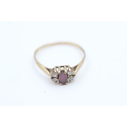 159 - 9ct gold ruby and white gemstone multistone ring (1.5g)