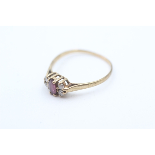 159 - 9ct gold ruby and white gemstone multistone ring (1.5g)