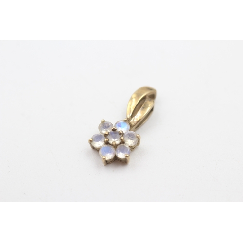 180 - 9ct gold moonstone floral cluster pendant (1.3g)