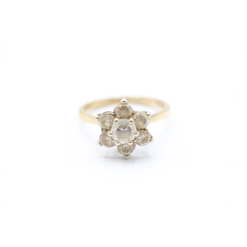 194 - 9ct gold cubic zirconia floral cluster dress ring (2.2g)