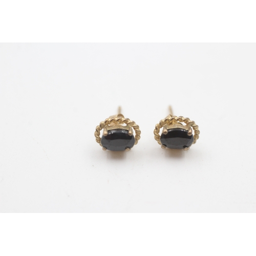 199 - 9ct gold vintage oval cut sapphire stud earrings (1.1g)