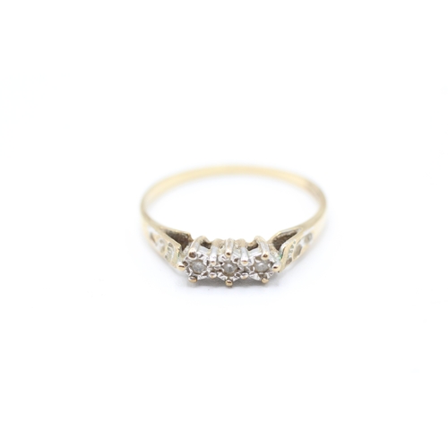 204 - 9ct gold diamond trilogy dress ring (1.6g)